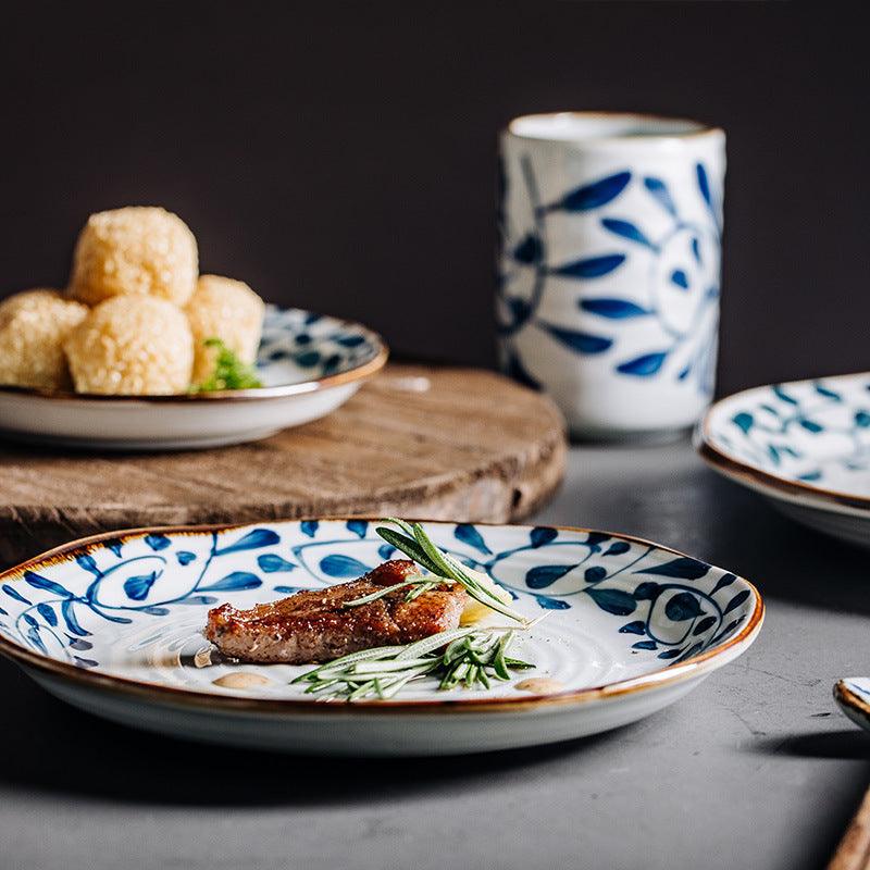 Japanese Creative Ceramic Plate with Irregular Rib Ruffle – Underglaze Floral Design in Multiple Sizes